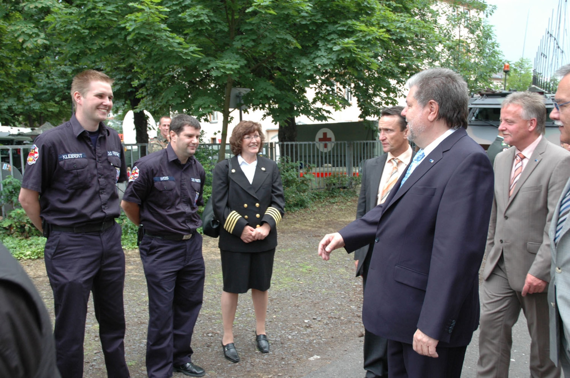 During the Rheinland-Pfalz state fair in Bad Neuenahr-Ahrweiler, the Minister President of Rheinland-Pfalz, Kurt Beck visits members of the Spangdahlem fire department, who participated in the three-day military forces exhibitions there. (U.S. Air Force photo/Iris Reiff)