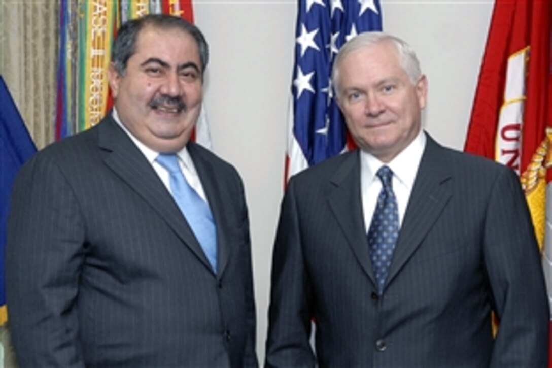 U.S. Defense Secretary Robert M. Gates, right, poses with Iraqi Foreign Minister Hoshyar Zebari before meeting with him inside the Pentagon, June 18, 2008.  
