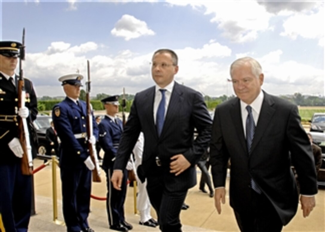 Secretary of Defense Robert M. Gates (right) escorts Bulgarian Prime Minister Sergei Stanishev through an honor cordon and into the Pentagon on June 17, 2008.  Gates and Stanishev will meet to discuss a broad range of security issues of mutual interest.  