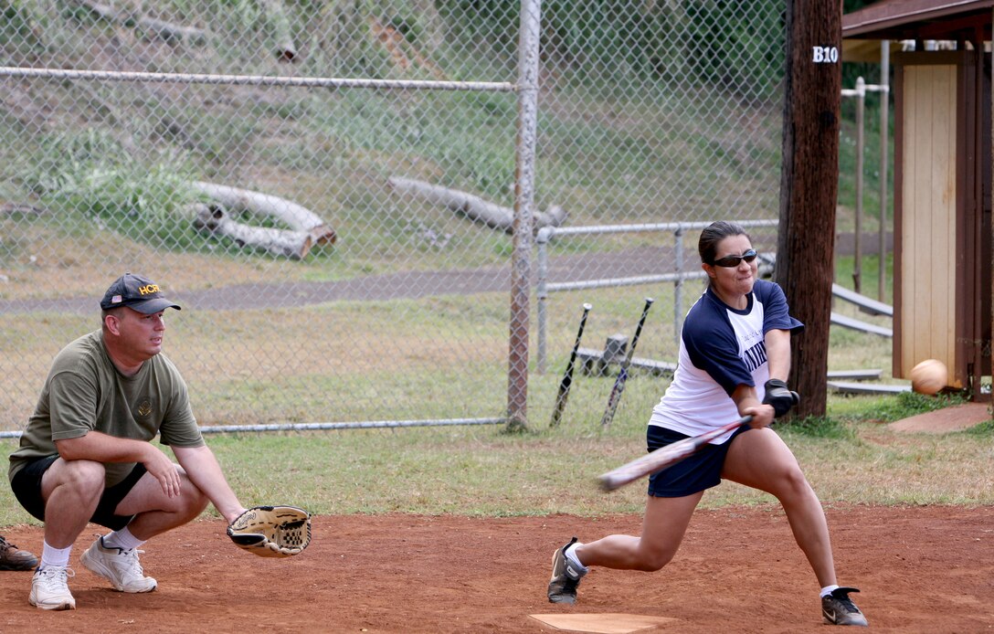 Vanessa Soto, Annihilators’ center fielder, cuts into a pitch during the final 2008 Camp Smith Intramural Softball League game at Bordelon Field June 19 here.