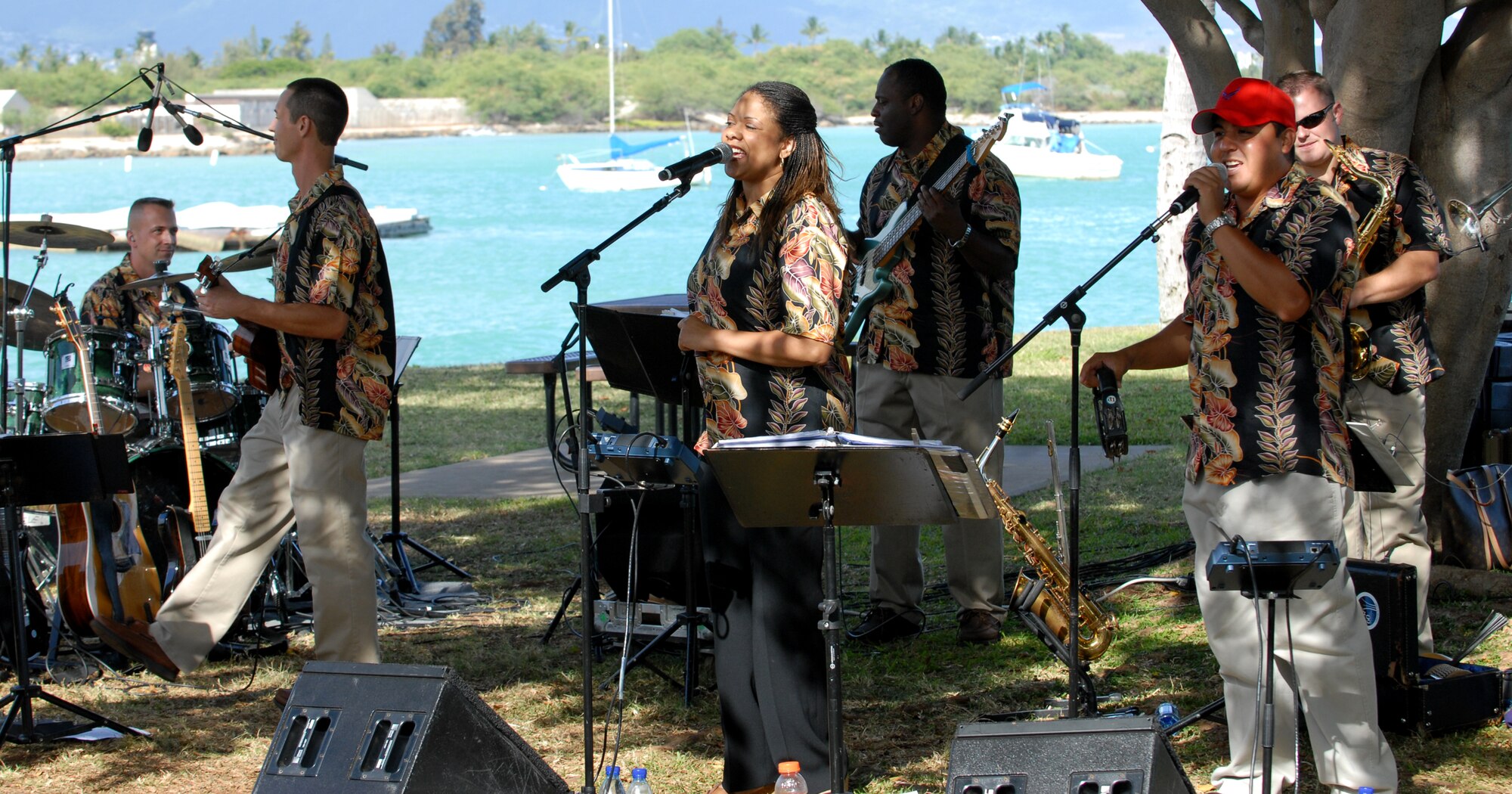 Hana Hou Band, The USAF Band of the Pacific, performs at Aloha Wednesday. During the event, they performed a mix of classic rock’n’roll, Grammy Award-winning country songs, and sounds of today’s Top 40, as well as island favorites. (U.S. Air Force Photo/Staff Sgt. Erin Smith)