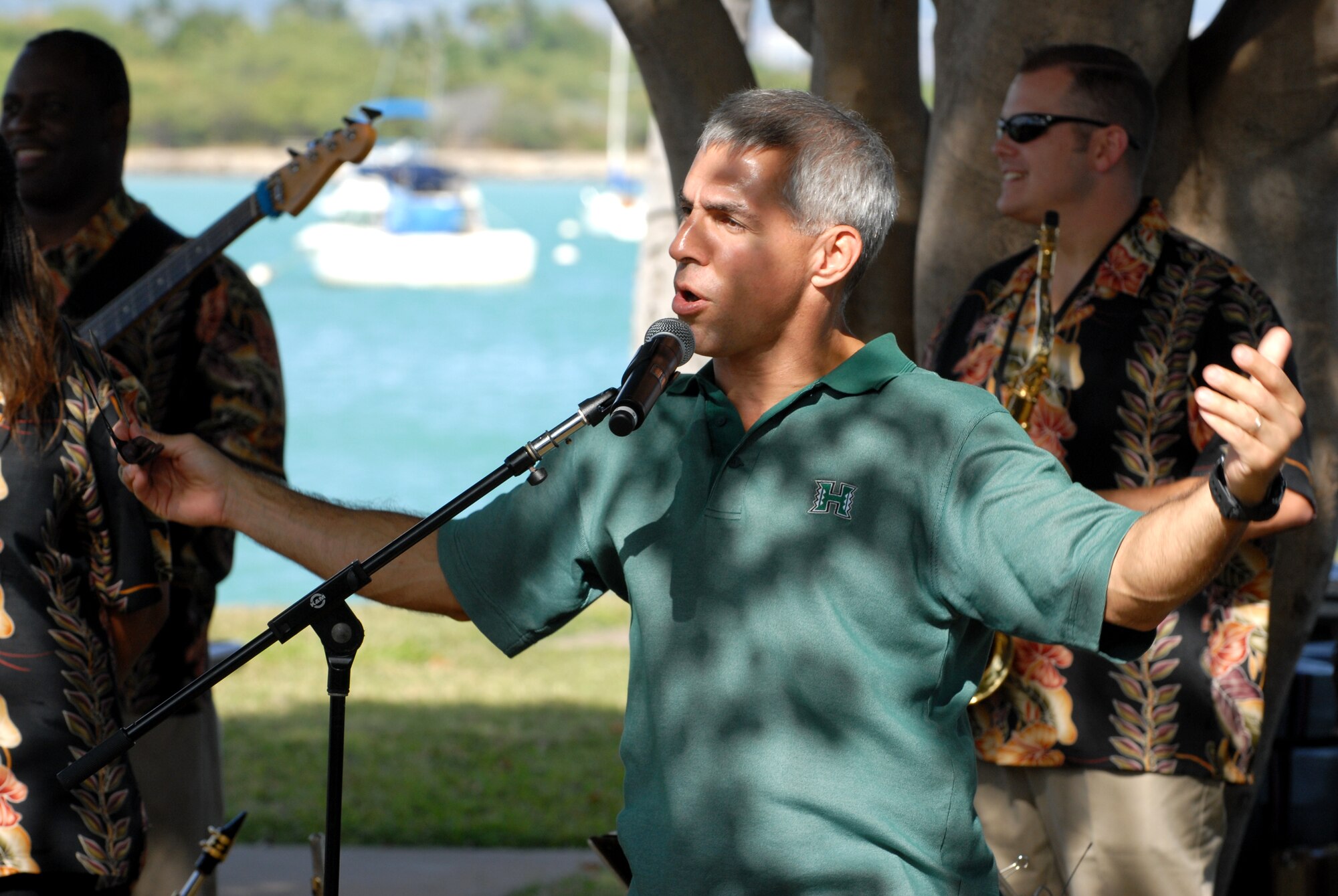 Col. JJ Torres, 15th Airlift Wing commander, welcomes Team Hickam members to the Aloha Wednesday celebration, June 18 at Foster's Point. (U.S. Air Force Photo/Staff Sgt. Erin Smith)