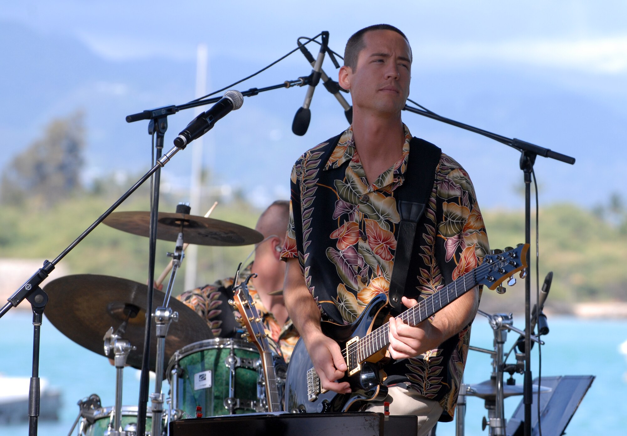 Staff Sgt. John Kukan performs at Aloha Wednesday, a 15th Airlift Celebration at Foster's Point. (U.S. Air Force Photo/Staff Sgt. Erin Smith)
