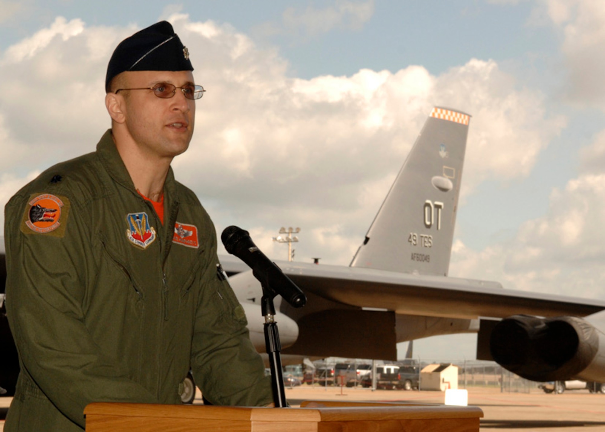 Lt. Col. Lane Humphreys speaks to his family, guests and his new squadron after accepting command of the 49th Test and Evaluation Squadron during a ceremony at Barksdale Air Force Base, La., June 13. Colonel Humphreys takes the reins of the squadron from Lt. Col. Kelly Lawson. Air Force photo. 