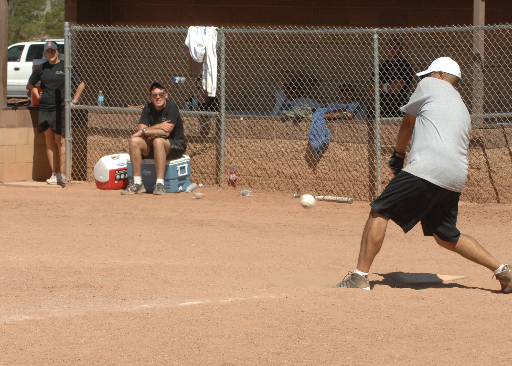Tech Sgt. Henry Luna, 746th Test Squadron, logistics material control activity NCOIC swings at the softball in the 1st inning of the 46th Test Group Charity Softball Game June 12 on Holloman Air Force Base, N.M. The 46th Test Group military and civilians raised money for a local non- profit organization in the Alamogordo community.  

(U.S. Air Force photo/Senior Airman Anthony Nelson Jr)
