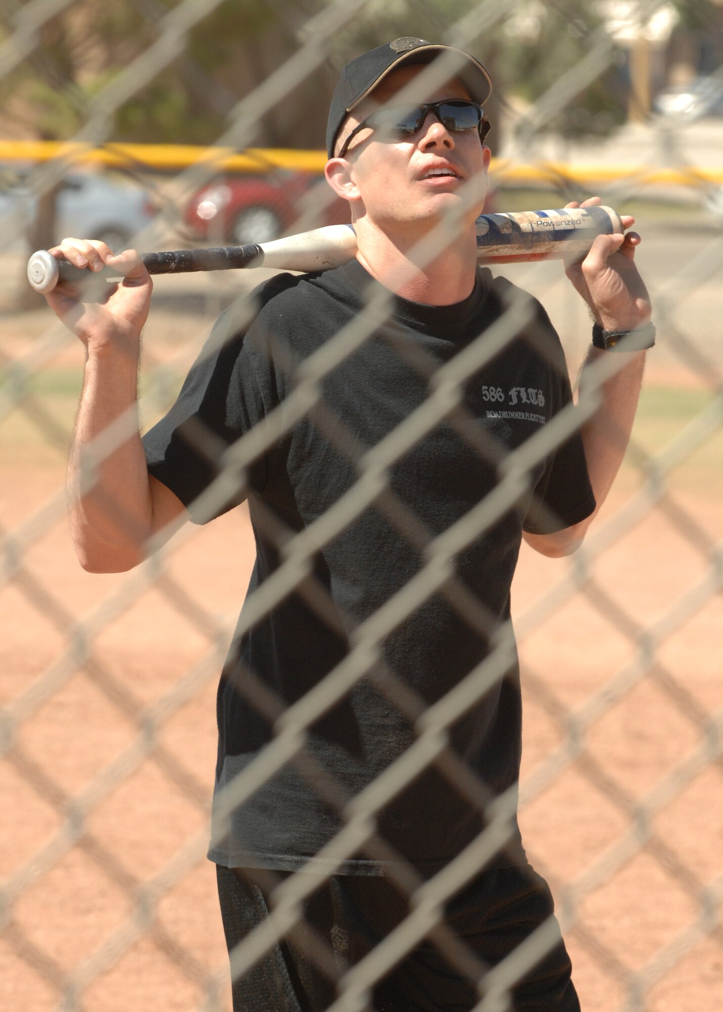 Maj. Shawn Morgenstern, awaits his chance to bat during the 46th Test Group's Charity Softball Game June 12 on Holloman Air Force Base, N.M. Major Morgenstern is the Assistant Director of Operations assigned to the 586th Flight Test Squadron. The charity game was in conjunction with their sports day. The 46th Test Group military and civilians raised money for a local non- profit organization in the Alamogordo community. 
(U.S. Air Force photo/Senior Airman Anthony Nelson Jr)
