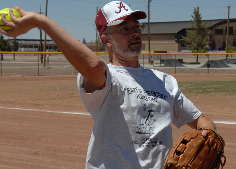 Mr. Bob Hudson warms up his arm by throwing the softball to a teammate before the 46th Test Group's Charity Softball Game June 12 on  Holloman Air Force Base, N.M.
Mr. Hudson is assigned to the 49th Force Support Squadron Manpower office. The charity game was in conjunction with their sports day. The 46th Test Group, military and civilians raised money for a local non- profit organization in the Alamogordo community.
(U.S. Air Force photo/Senior Airman Anthony Nelson Jr)
