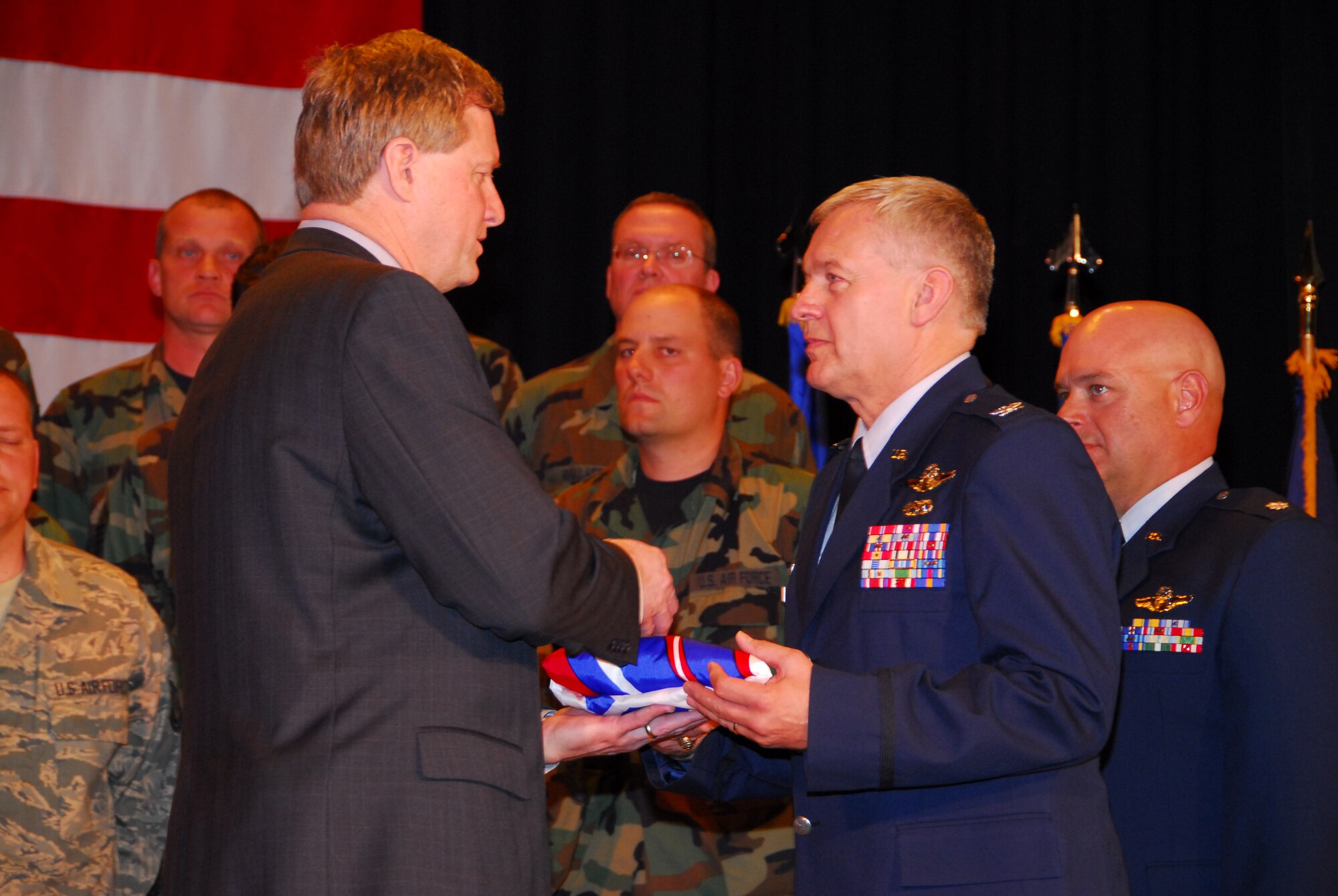 The 148th Fighter Wing, Duluth, Minn. was presented with OSHA's Voluntary Protection Program STAR rating at an awards ceremony in Duluth, Minn. on June 15, 2008.  The VPP STAR flag was presented by the Honorable Edwin G. Foulke, Assistant Secretary of Labor for Occupational Safety and Health to U.S. Air Force Col Mark R. Johnson, Wing Commander.  (U.S. Air Force photo by Tech. Sgt. Brett R. Ewald)  (Released)
