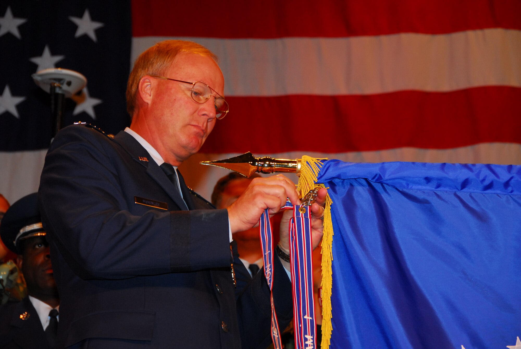 U.S. Air Force Lt Gen Craig McKinley, Director of the Air National Guard presents the 148th Fighter Wing, Duluth, Minn. with the Outstanding Unit Award on June 15, 2008 during an awards ceremony.  The wing received the Outstanding Unit Award for its involvement in multiple deployments in the United States and overseas, high recruiting and retention rates, and exceptional inspection results.  (U.S. Air Force photo by Staff Sgt. Donald Acton)  (Released)