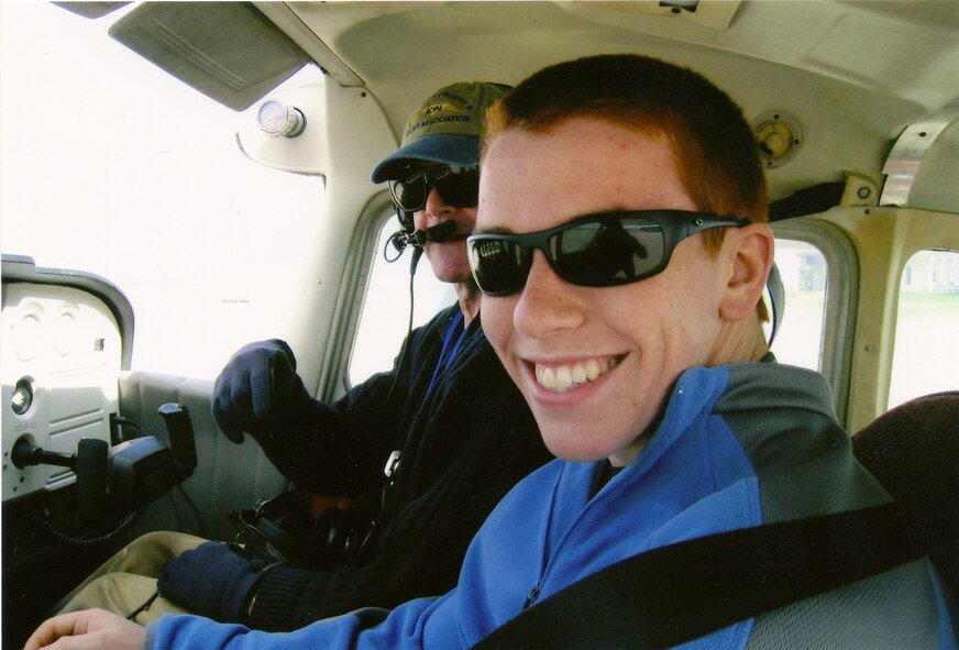 Tyler Heck sits in the cockpit of a Cessna air plane about to taxi off to the runway at the Air Force Services Teen Aviation Camp. He had the opportunity to pilot the plane; take off, fly, and land. Courtesy photo