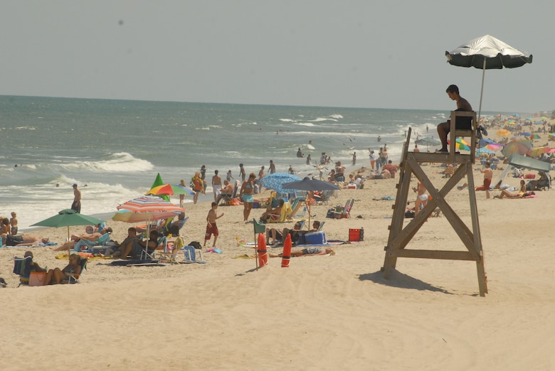 A lifeguard overlooks Kure Beach Saturday while familes enjoy the sun at the beach. (U.S. Air Force Photo by Staff Sgt. Jon LaDue)