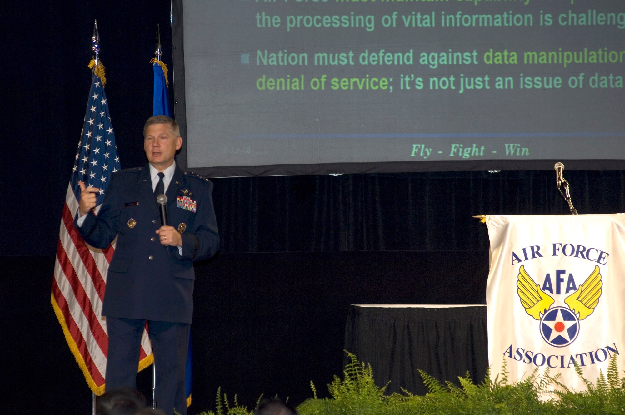 Lt. Gen. Robert J. Elder addresses the Air Force's 2nd annual Cyberspace Symposium June 18 in Marlborough, Mass.  General Elder is the commander of Eighth Air Force. (U.S. Air Force photo/Rick Berry)
