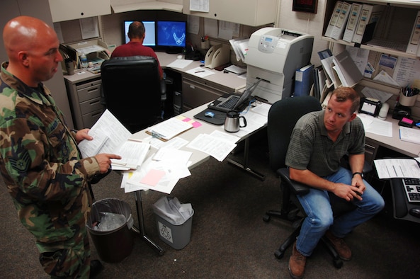Staff Sgt. Jon Barber (left) asks Tech. Sgt. Ed Cropper about a training-related issue at the 931st Aircraft Maintenance Squadron on June 19.  Sergeant Cropper is the squadron's unit deployment manager and has been busy preparing for participation in an Operational Readiness Inspection and deployments to Turkey that begin next week.  More than 40 AMXS Airmen have volunteered to support an Air Expeditionary Force in Turkey.  Sergeant Barber is an AMXS crew chief.
