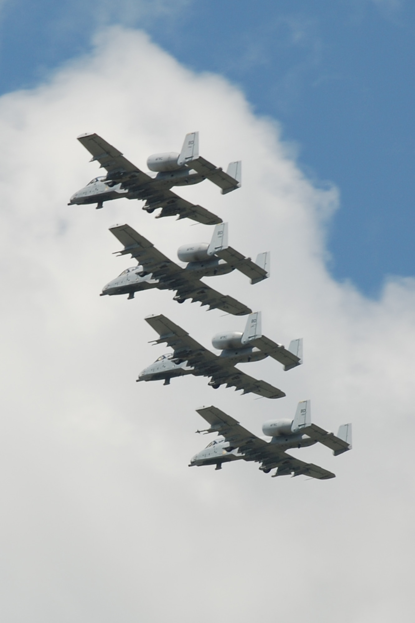 47th Fighter Squadron pilots Lt Cols Brady Glick, James Macaulay, Dave Deaton, and Marc Olson perform a 4-ship flyby following a record breaking sortie for the most combined flying hours in the A-10 Thunderbolt II with a total of 17,742 hours, on June 13, 2008, 917th Wing, Barksdale AFB, La. (U.S. Air Force photo by Master Sgt. Gregory W. Steele/Released)