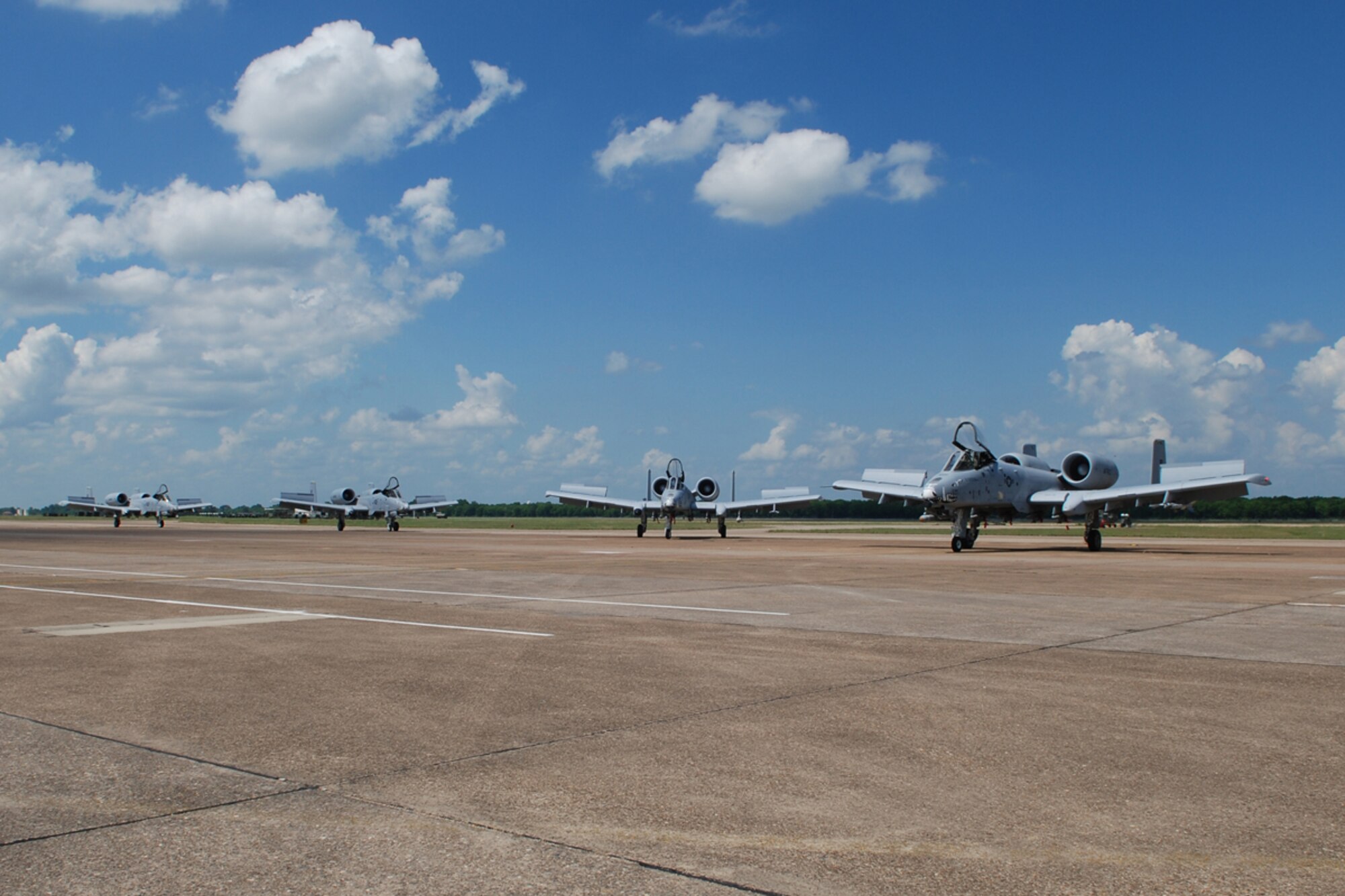 Four 47th Fighter Squadron A-10 Thunderbolt IIs return from a flying hours record setting sortie on June 13, 2008, 917th Wing, Barksdale AFB, La. Lt Cols Brady Glick, James Macaulay, Dave Deaton, and Marc Olson totaled 17,742 flying hours and over 10,000 sorties in the A-10. In the lead A-10, Lt Col Brady Glick set a single all-time flying hours record in the A-10 with 4,666 flying hours and 2,495 sorties. (U.S. Air Force photo by Master Sgt. Gregory W. Steele/Released)