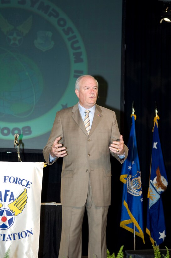 Secretary of the Air Force Michael W. Wynne addresses the Air Force's second Cyberspace Symposium in Marlborough, Mass., June 18. (U.S. Air Force photo/Rick Berry)

