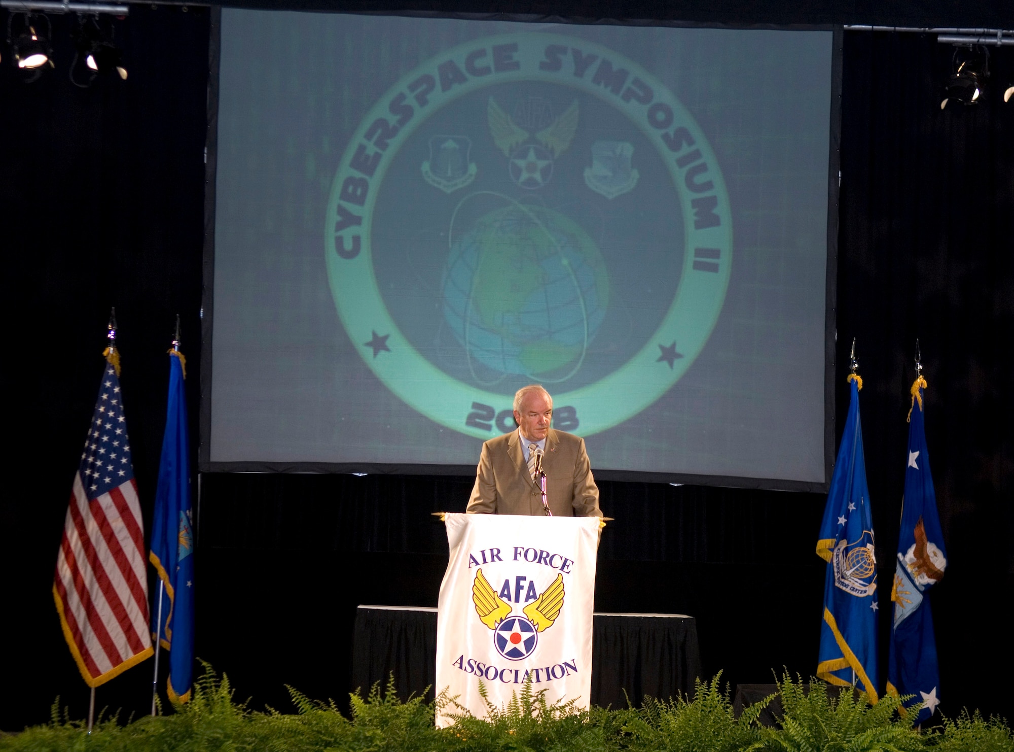 Air Force Secretary Michael W. Wynne addresses the second Cyberspace Symposium in Marlborough, Mass., June 18. (U.S. Air Force photo/Rick Berry)