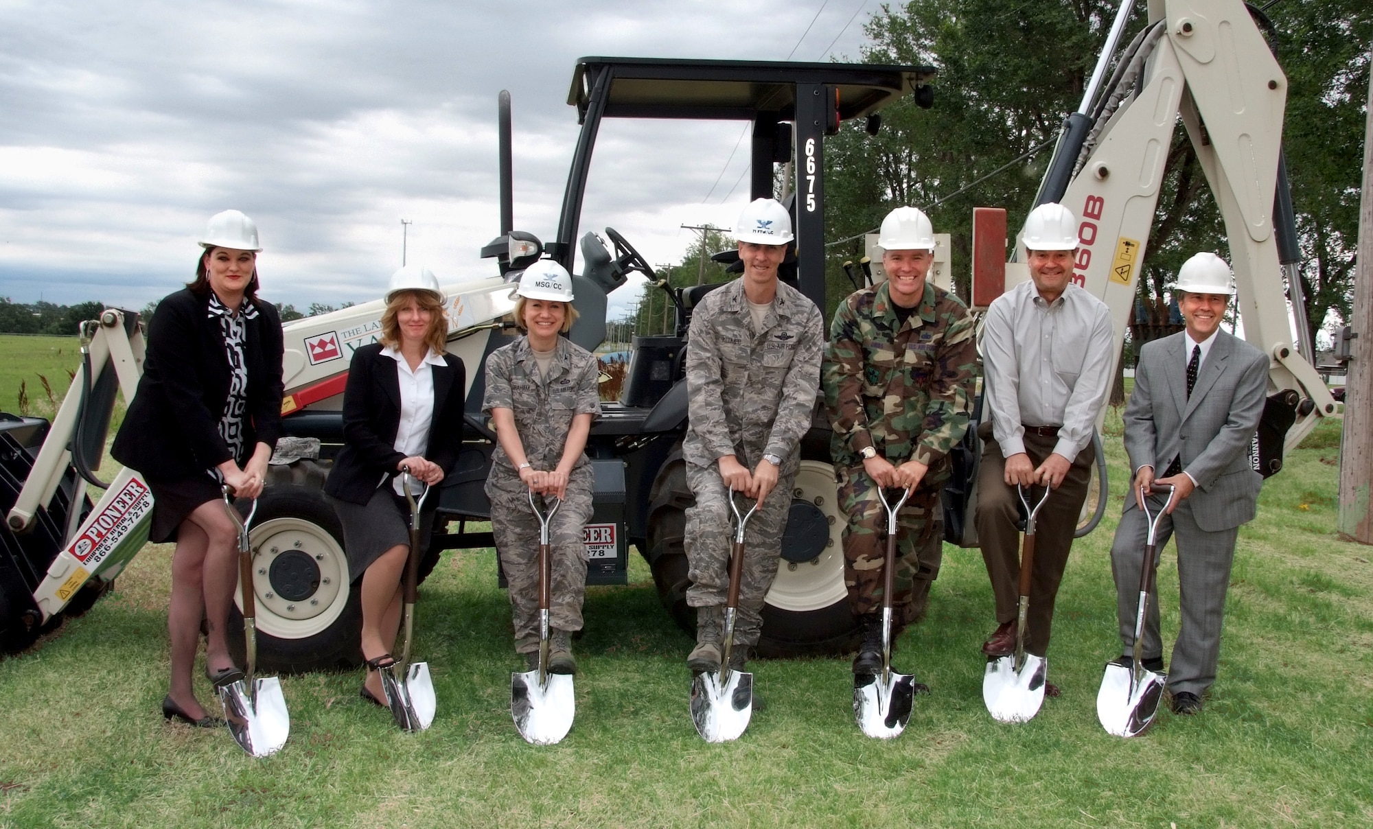 Ground was broken for 30 new military-family housing units June 15 at Vance Air Force Base, Okla. Wielding the shovels are (left to right) Elizabeth Kirkpatrick, assistant investment manager for Pinnacle-Hunt Communities; Denise Hauck, investment manager with Pinnacle-Hunt; Col. Jennifer Graham, 71st Mission Support Group commander; Col. Richard A. Klumpp Jr., 71st Flying Training Wing commander; Maj. Darren Gibbs, 71st Logistics Readiness Squadron commander; Ron Hanson, project manager for Hunt Construction; and Kent Plemons, with Pinnacle Development. (U.S. Air Force photo by Terry Wasson)