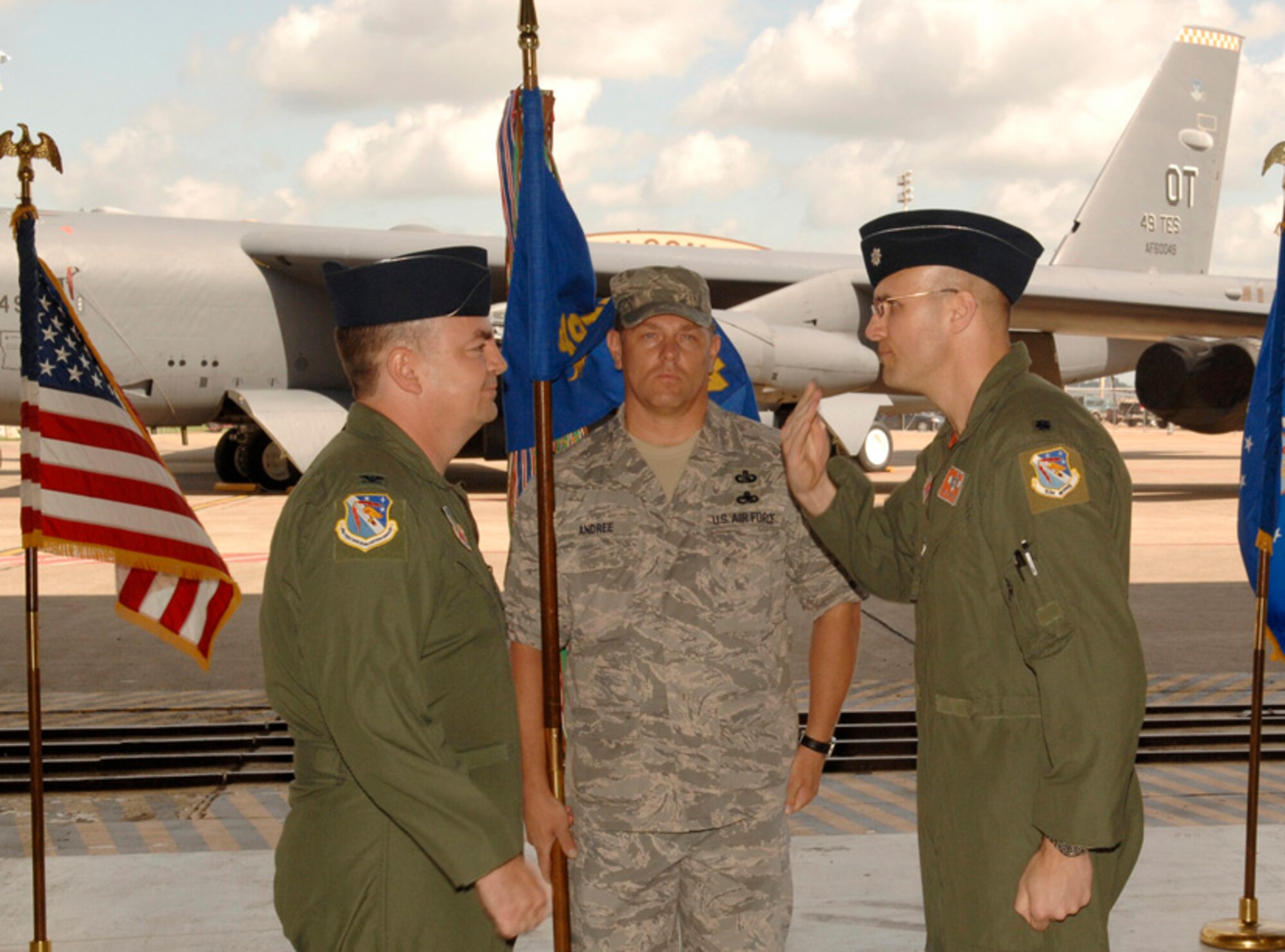 Lt. Col. Lane Humphreys salutes Col. Charles Corley, 53d Test and Evaluation Group commander, after accepting command of the 49th Test and Evaluation Squadron during a ceremony at Barksdale Air Force Base, La., June 13.  Colonel Humphreys takes the reins of the squadron from Lt. Col. Kelly Lawson.  Air Force photo.