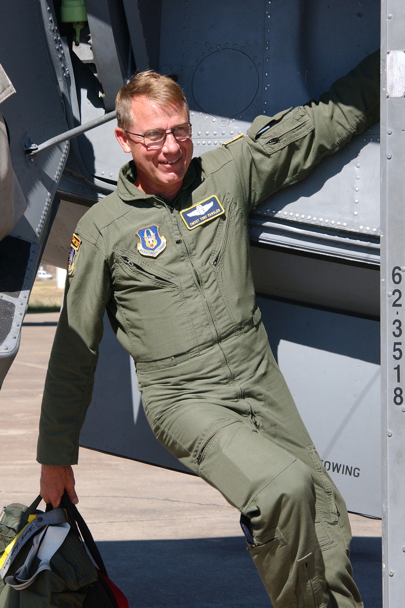 INCIRLIK AB, TURKEY -- Chief Master Sgt. Tony Fansler, 90th Expeditionary Air Refueling Squadron, exits a KC-135 after completing a mission in which he surpassed 10,000 flying hours June 19. Back at Grissom, Chief Fansler is assigned to the 72nd Air Refueling Squadron.  (U.S. Air Force photo/Airman 1st Class Benjamin Wilson)