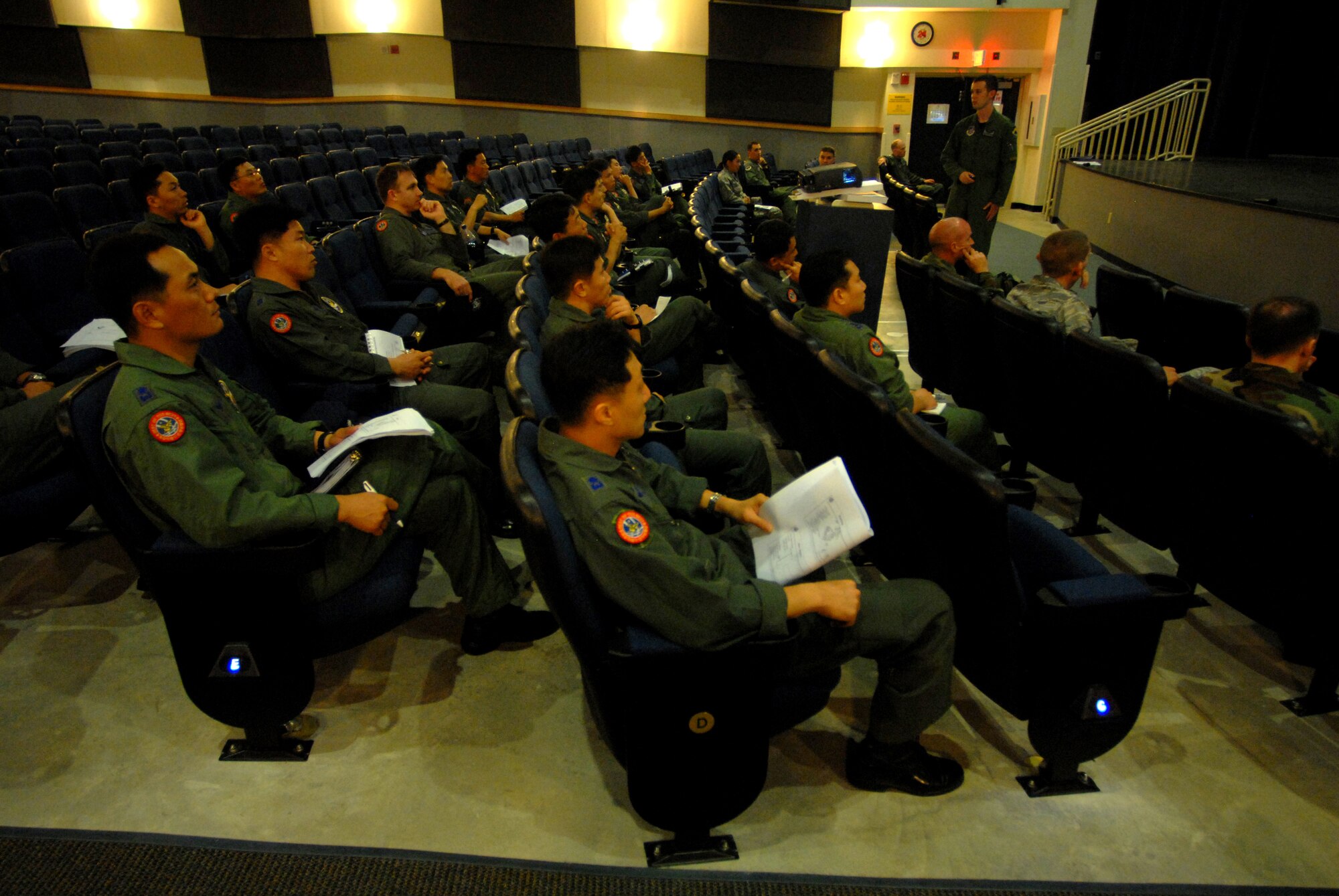KUNSAN AIR BASE, Republic of Korea -- Captain Brian Kellam, an F-16 pilot with the 80th Fighter Squadron, briefs members of the Republic of Korea Air Force's 11th Fighter Wing during an inbrief for Max Thunder here June 16.  Max Thunder 08-01 is a bi-lateral training exercise between USAF and ROKAF airmen used to strengthen joint operations and sharpen war fighting skills.  