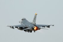 An F-16 Fighting Falcomn from the 80th Fighter  Squadron, takes off during exercise Max Thunder 08-01 here June 19. Training side-by-side is part of day-to-day operations for ROKAF and USAF forces at Kunsan Air Base. The bi-lateral training received during Max Thunder will not only improve interoperability, but is also intended to assist the ROKAF prepare for RED FLAG Nellis in August 2008. (U.S. Air Force photo by Senior Airman Angela Ruiz)