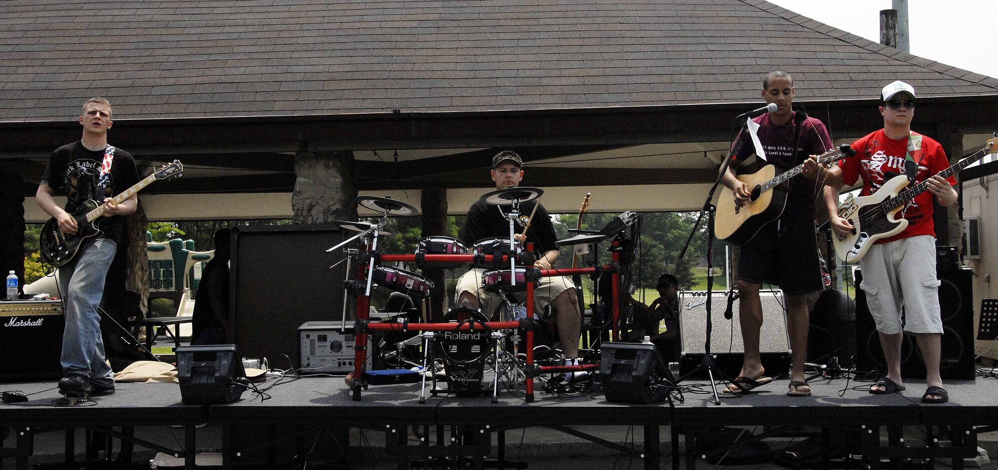 OSAN AIR BASE Republic of Korea – The band, Jay Walkers, perform Osan's first  Cold Steel Sprint Triathlon held June 14. (U.S. Air Force photo/Staff Sgt. Lakisha Croley)