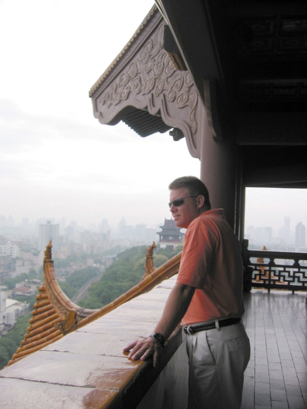 Chief Master Sgt. John T. Salzman, command Chief Master Sgt., 13th Air Force, Pacific Air Force, looks out from the Yellow Crane Tower in Wuhan, China June 19.::r::::n::Salzman was a member of the first all-enlisted delegation to China.  The purpose of the delegation was to gain a better understanding of the People's Liberation Army's enlisted forces and military in general.