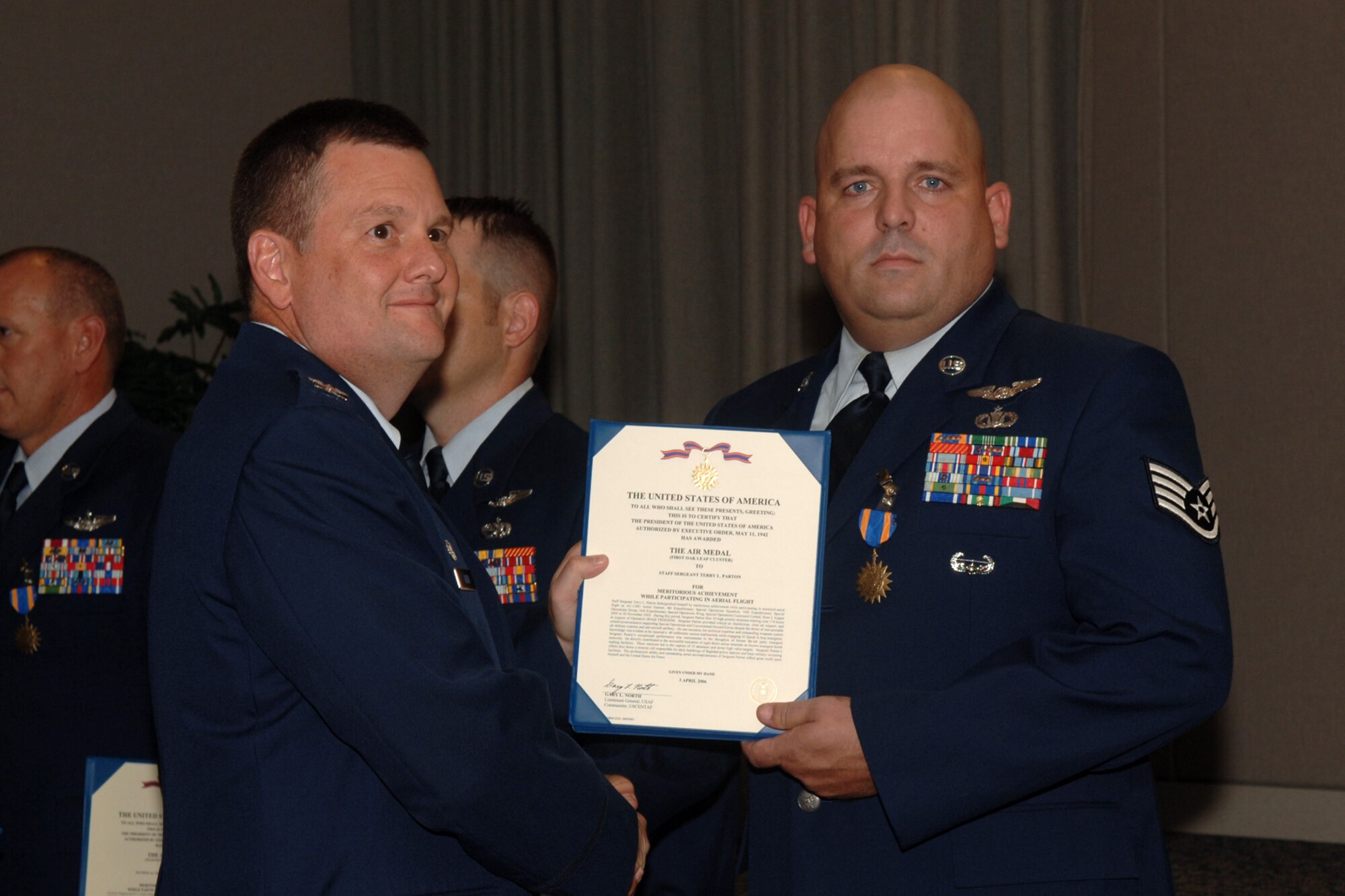 Staff Sgt. Terry Parton  from the 4th Special Operations Squadron Hurlburt Field, Fla., is awarded the Single Mission Air Medal for extraordinary achievement while participating in aerial flight as an AC-130U crew, June 20, 2008. U.S. Air Force photo by SrA Emily Moore.