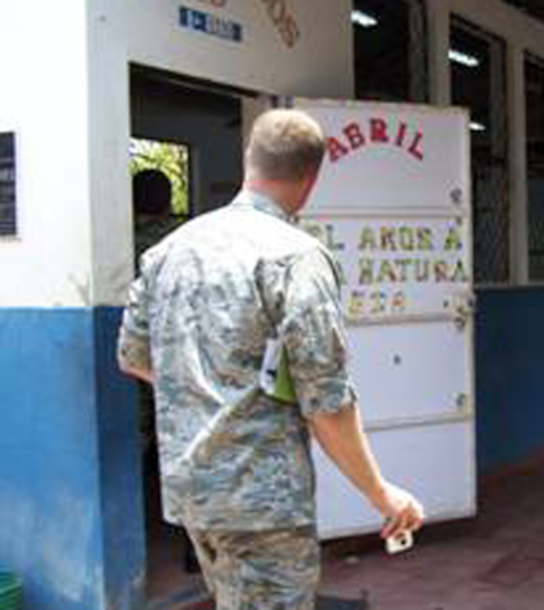 An advance 21st Medical Group site survey team, led by Lt. Col. Rich Eddington, inspects a local school in May to be used as one of three medical treatment sites in San Miguel, El Salvador. The 21 MDG Medical Readiness Training Exercise team is deployed in the Central American country, providing free medical care to the El Salvadoran people. The team is providing medical support June 18 - July 3. (U.S. Air Force photo/1st Lt. Denise Miranda)