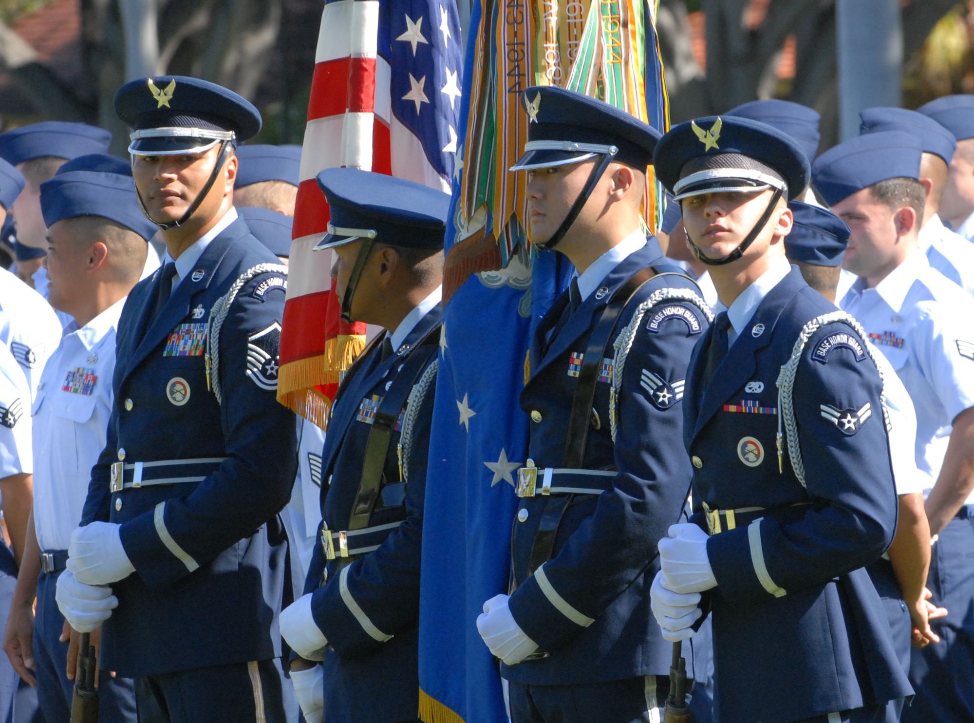 Hickam Air Force Base Honor Guard stands at ease as they await the beginning of the ceremony. The Honor Guard posted the colors for the Change of Command. (U.S. Air Force Photo/Tyler Hatfield)