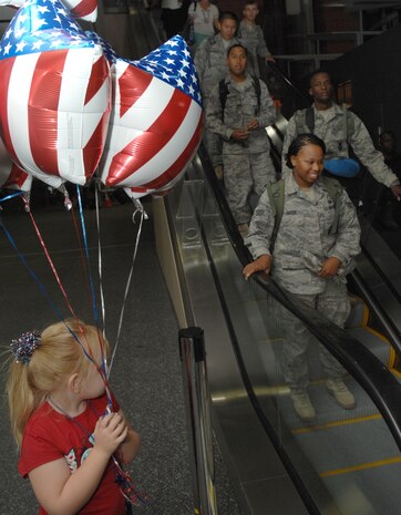 Five year old Michele Van Leiden, shows her support for Airmen returning from a recent deployment at McCarran International Airport, Las Vegas, Nev., June 17, 2008. The thirty two Airmen completed a six month deployment to Camp Bucca, Iraq in support of Operation Iraqi Freedom. The Airmen are all assigned to the 99th Security Forces Group, Nellis Air Force Base, Nev.
(U.S. Air Force Photo by/Senior Airman Larry E. Reid Jr.)