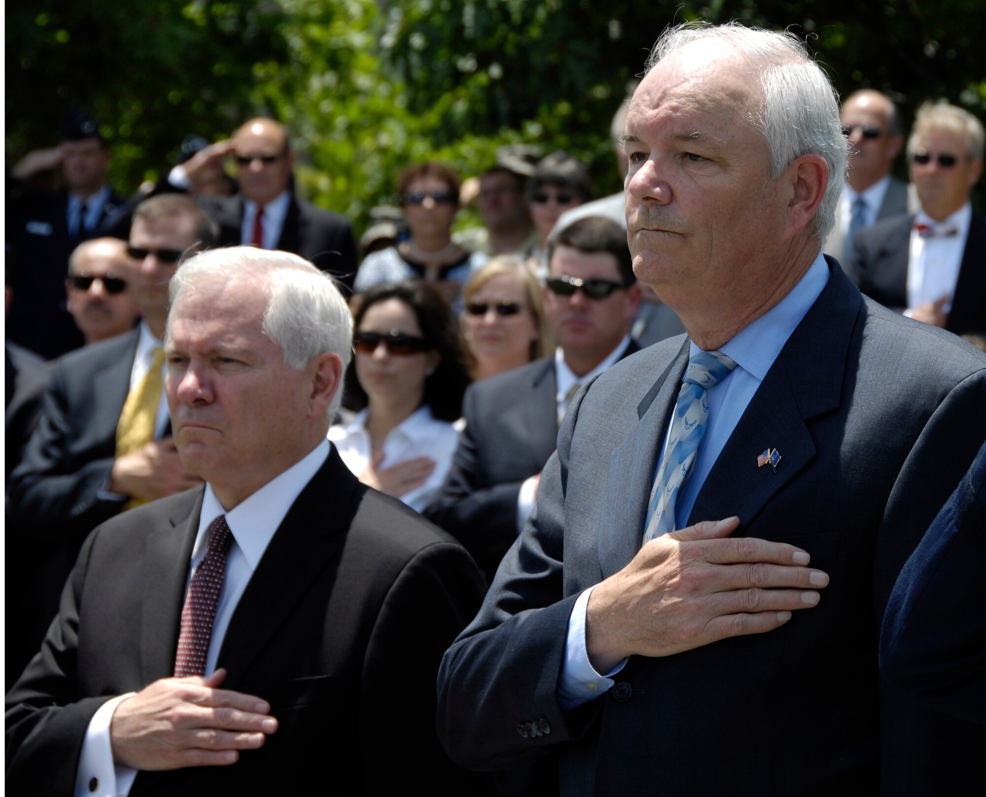 The official party pays honors during the National Anthem during a farewell ceremony in honor of Michael W. Wynne, Secretary of the Air Force at the U.S. Air Force Memorial, Arlington, Va., June 20. From left to right are Defense Secretary Robert M. Gates and Air Force Secretary Wynne. Secretary Wynne is the Air Force's 21st secretary.  (U.S. Air Force photo/Ms. Donna Parry)