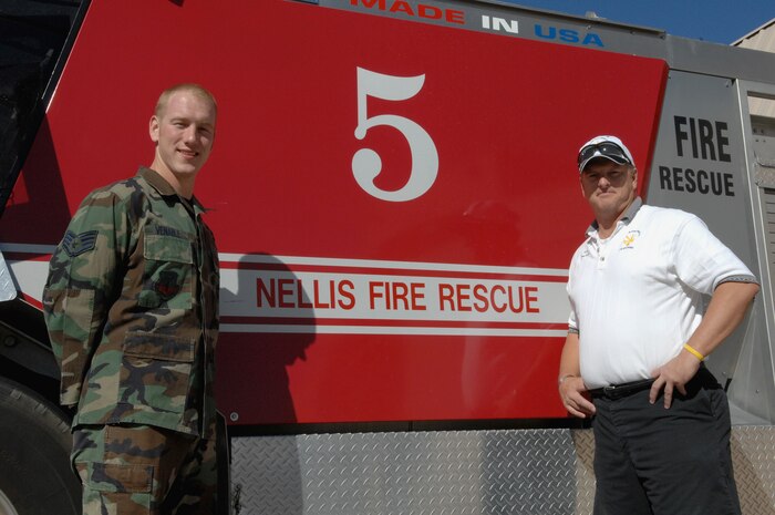 Staff Sgt. Joshua Venable (left), an airborne firefighter, and his dad, Mr. Ed Venable, the B-shift assistant fire chief, both members of the 99th Civil Engineer Squadron fire department at Nellis Air Force Base, Nev.,  are glad to be assigned to the same fire department because it enables them to spend more time together.  The two have been working together in the since Sergeant Venable arrived here four years ago, and this unique situation has been a positive experience for both men.  (U.S. Air Force photo / Senior Airman Kasabyan D. Musal)