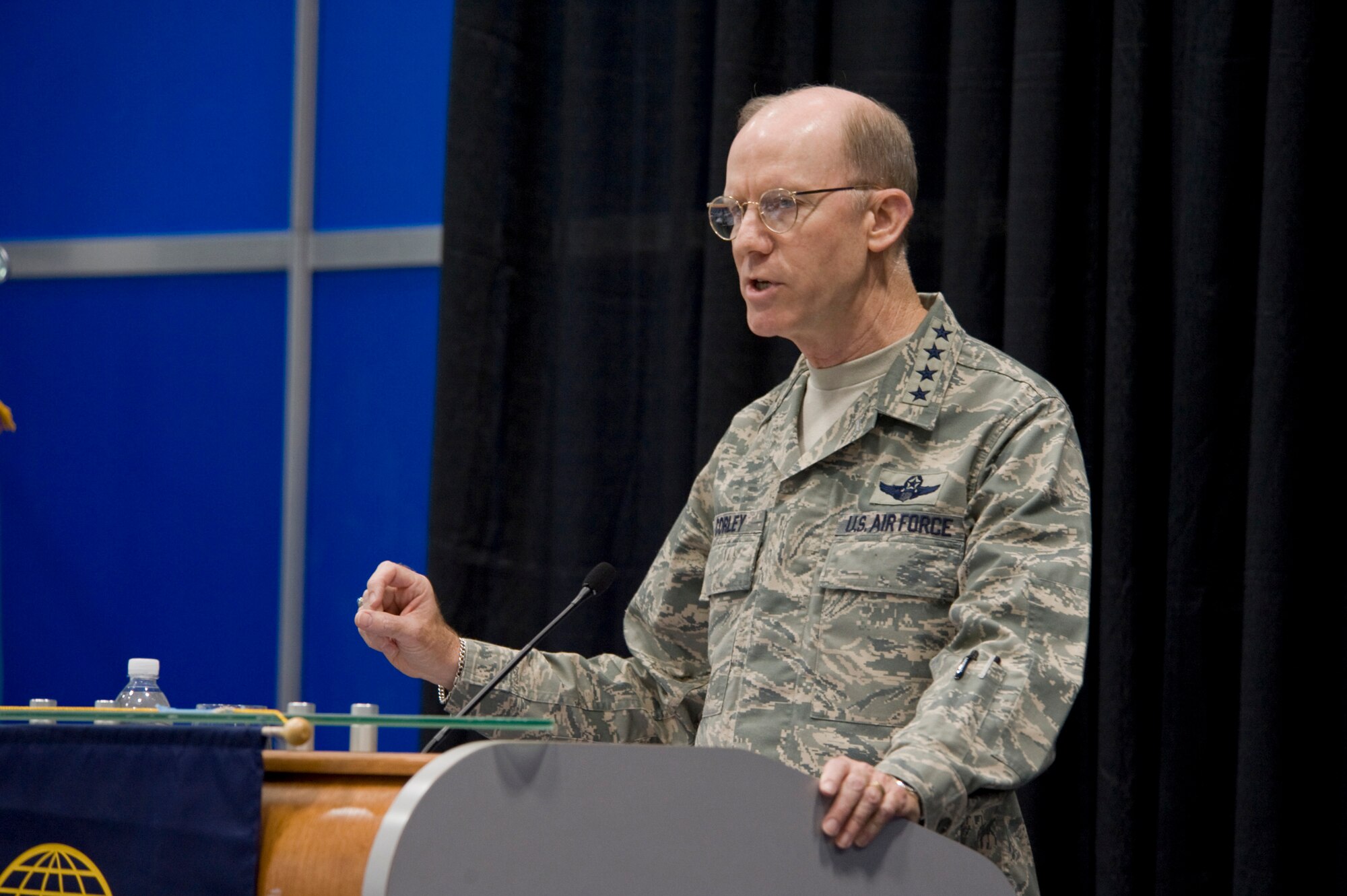 VIRGINIA BEACH, Va. -- Gen. John D. W. Corley, Air Combat command commander, addresses a standing-room-only crowd June 19 at the Joint Warfighting Conference hosted here. The three-day conference brought together civilian, contractor and Defense Department personnel with vendors who specialize in national defense to share ideas and collaborate on the challenges inherent to fielding a joint multinational military force that is trained, equipped and capable of operating in a global theater at a moment's notice. (DoD photo/Staff Sgt. Joe Laws) 
