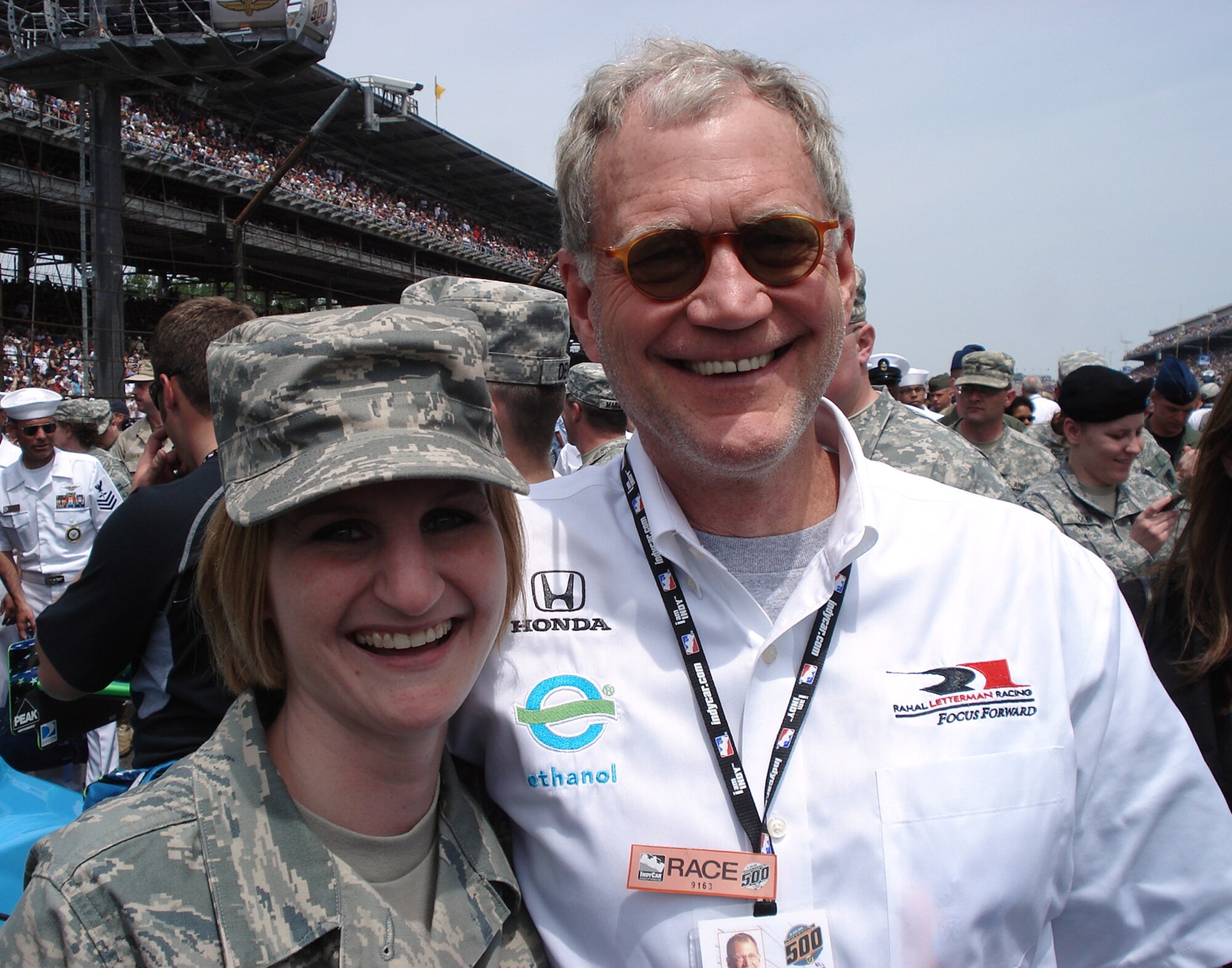 Tech. Sgt. Darlene Poindexter, a 338th Recruiting Squadron recruiter, caught up with Rahal/Letterman Racing Team owner David Letterman in the pit area of the Indianapolis Motor Speedway prior to the 92nd Indianapolis 500 May 25. Recruiters from the 330th and 338th Recruiting squadrons participated in pre-race activities and spoke to drivers and teams about the Air Force mission. Air Force recruiters are actively involved with race fans at the speedway each year during qualifications weekend through interactive displays as part of an Armed Forces Day salute to the military. The efforts by Airmen and their sister services are also recognized at the track on race day. (U.S. Air Force photo/Tech. Sgt. Joe Poindexter)