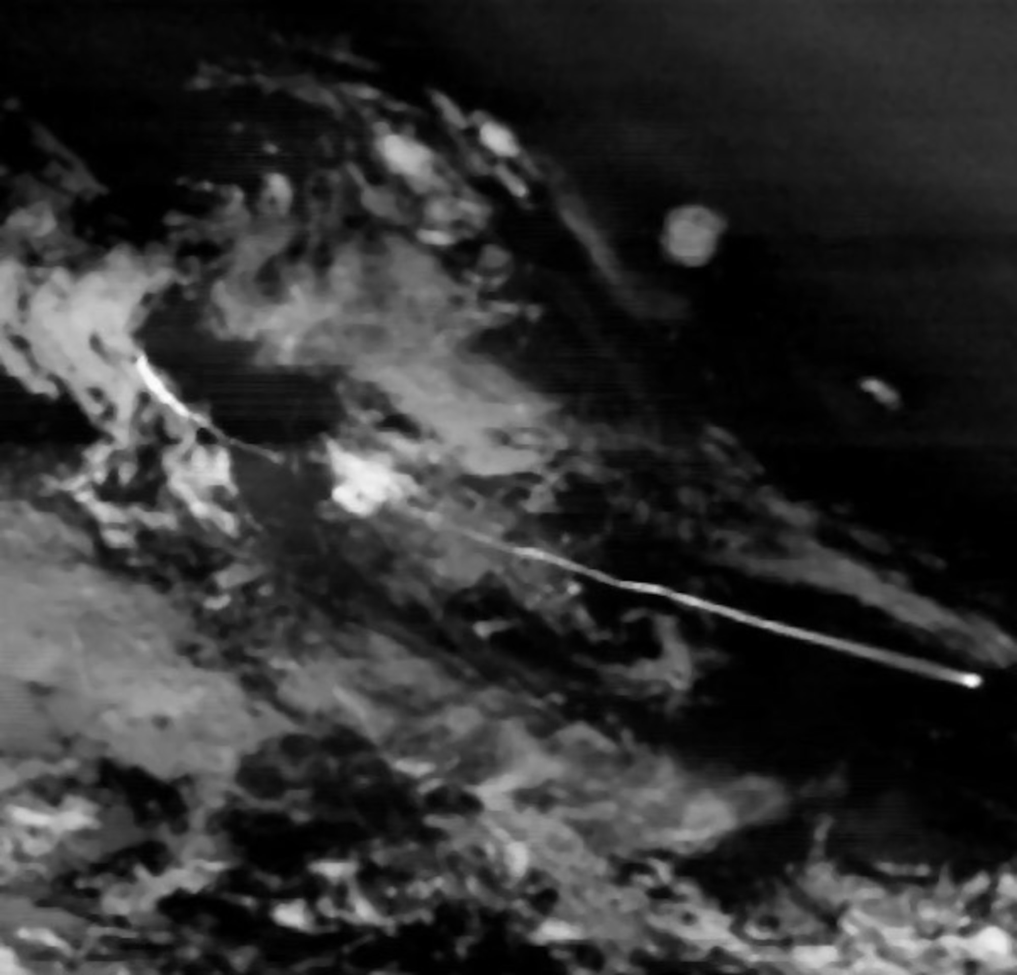Infrared satellite imagery from the Space Based Infrared Systems Highly Elliptical Orbit-2 sensor depicts a missile launch through the clouds. (U.S. Air Force photo)