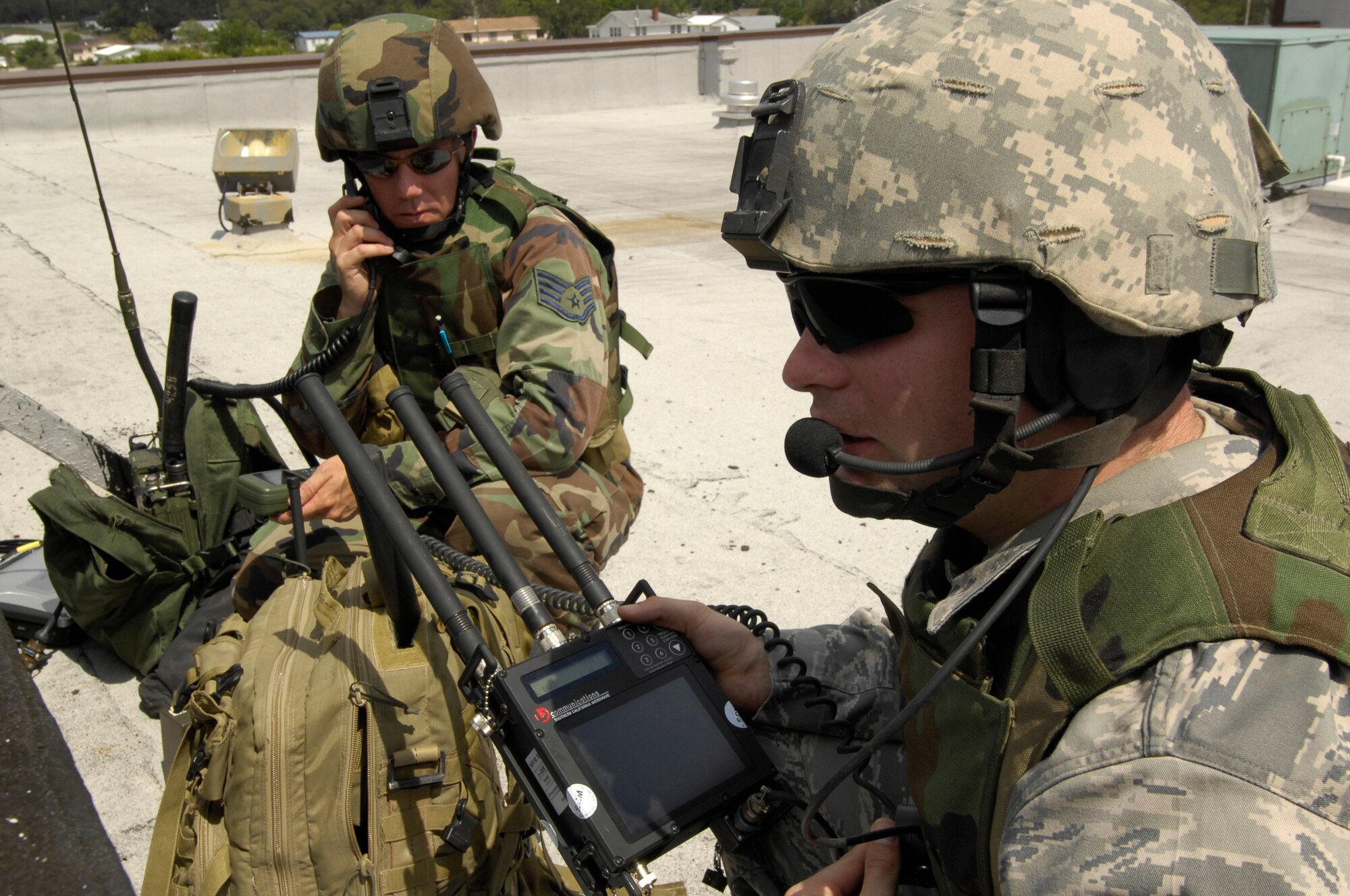 U. S. Air Force Joint Terminal Attack Controllers review map data using the MVRIII (Mini Rover) while participating in Atlantic Strike VII on June 16, 2008. The MVRIII is a GPS integrated micro computer utilized for targeting purposes. Atlantic Strike is a joint forces training event involving Joint Terminal Attack Controllers from the U.S. Army, Air Force and Marines  and is held semi-annually at Avon Park Air Ground training Complex, Avon Park, FL.

(U.S. Air Force photo by Staff Sgt. Stephen J. Otero)
