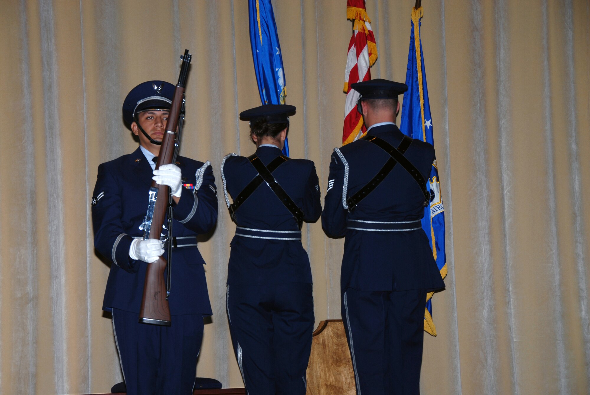 Members of the Maxwell AFB Honor Guard post the colors at the 908th Airlift Wing Change of Command ceremony June 7 at Maxwell AFB's Polifka auditorium.  Col. Brett Clark replaced Col. Michael Underkofler as commander of the Montgomery,Ala.-based C-130 unit. (U.S. Air Force photo by Mr. Jeff Melvin)