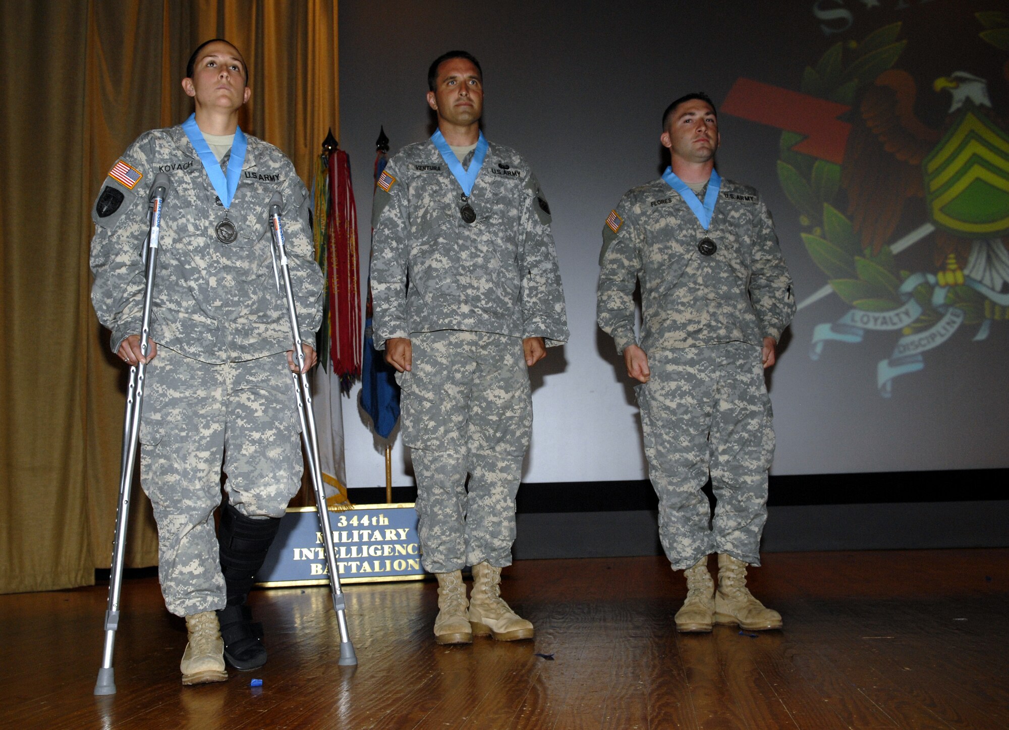 Army Sergeants 1st Class Crysta Kovach and Robert Ventura and Staff Sgt. Craig Flores were inducted into the Audie Murphy Club in front of more than 300 Soldiers June 17. (U.S. Air Force photo by Senior Airman Kamaile Chan)
