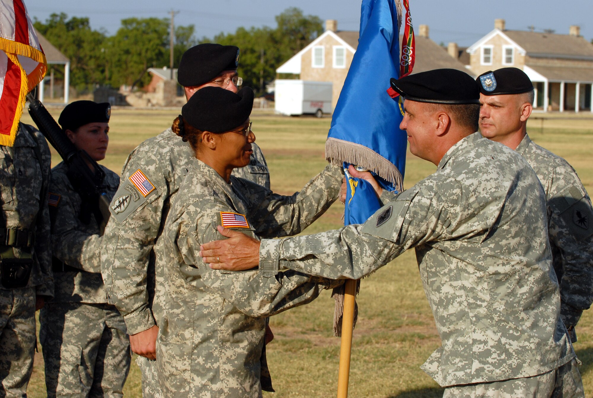 Lt. Col. Bichson Bush (left) assumes command of the 344 MIBn from Col. Dennis Perkins, 111th Military Intelligence Brigade commander, June 18 at historic Fort Concho. (U.S. Air Force photo by Staff Sgt. John Barton)