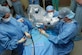 A surgical team from Wilford Hall Medical Center, San Antonio, Texas, performs ear surgery on a patient June 17 at Hospital Escuela in Tegucigalpa, Honduras. The 14-person team spent two weeks at the hospital performing ear, nose and throat procedures, as well as providing hearing tests and hearing aid fittings. (U.S. Air Force photo by Tech. Sgt. John Asselin)