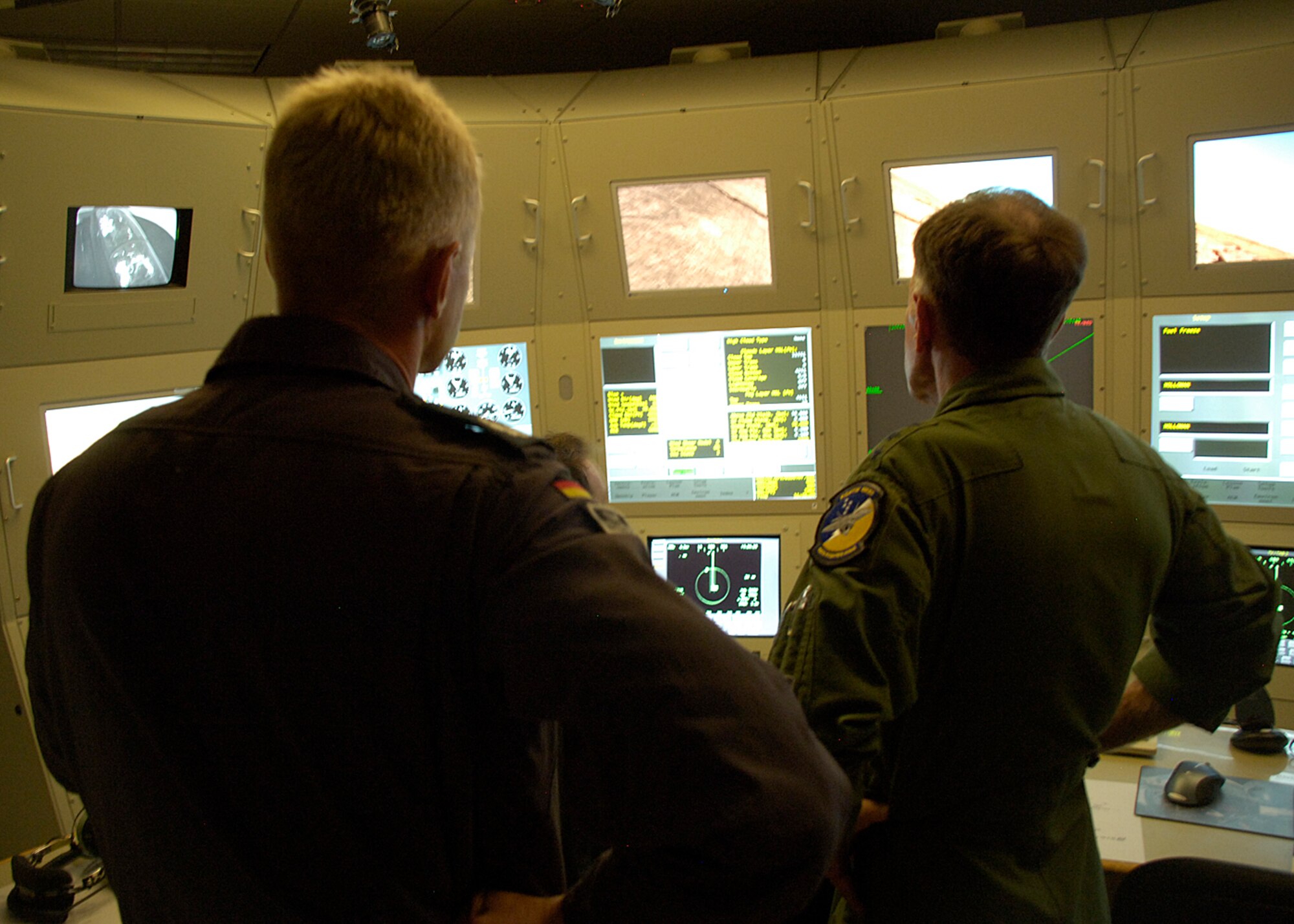 Lt. Gen. Norman R. Seip,12th Air Force commander, speaks with Col. Peter Klement (German Air Force Flying Training Center commander) during his visit to Holloman AFB, N.M., June 17. General Seip was given the opportunity to go through there Tornado simulator training. (U.S. Air Force photo/Airman 1st Class Michael Means)