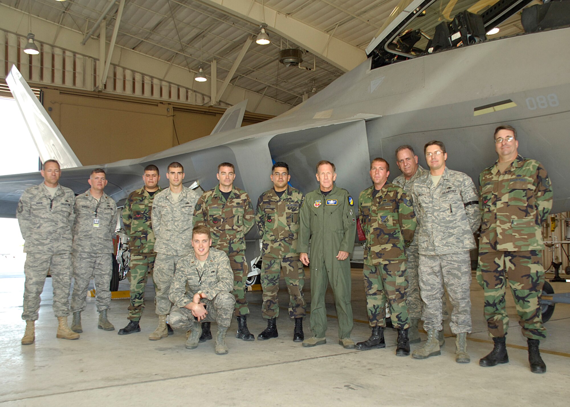 Lt. Gen. Norman R. Seip,12th Air Force commander, poses for a photo with Airmen from the 49th Aircraft Maintenance Squadron during his visit to Holloman AFB, N.M., June 17. Holloman is the first base under General Seip's command to receive the F-22A Raptor. (U.S. Air Force photo/Airman 1st Class Michael Means)