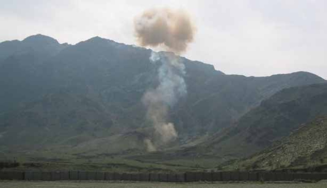 A weapons cache is blown up in Afgahnistan by Air Force Office of Special Investigations and  Air EOD personnel.  The weapons were obtained Special Agent Robert Lawler, amember of the Tinker OSI Detachment 114, when he was deployed in 2007.  (Courtesy photo)