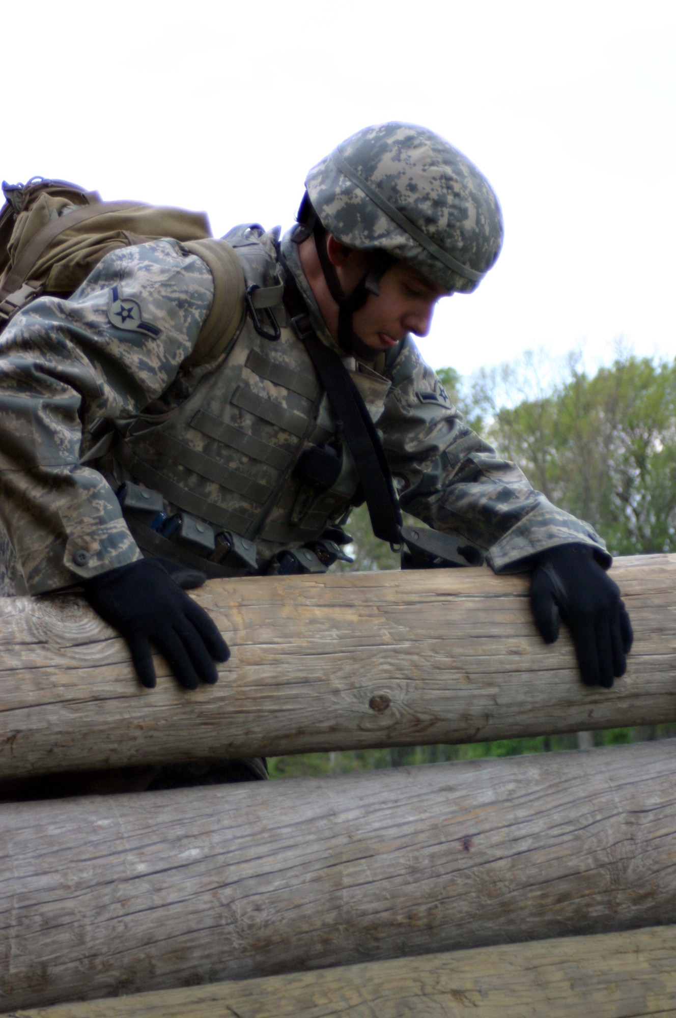 Airman Richard Fleming, 60th Security Forces Squadron, Travis AFB, Calif., overcomes an obstacle during Combat First Aid Training June 19 at Fort Dix, N.J. The 10-day course, Phoenix Warrior Training 08-5, is used as pre-deployment training for security forces members. (U.S. Air Force photo/Airman 1st Class Rebekah Phy)