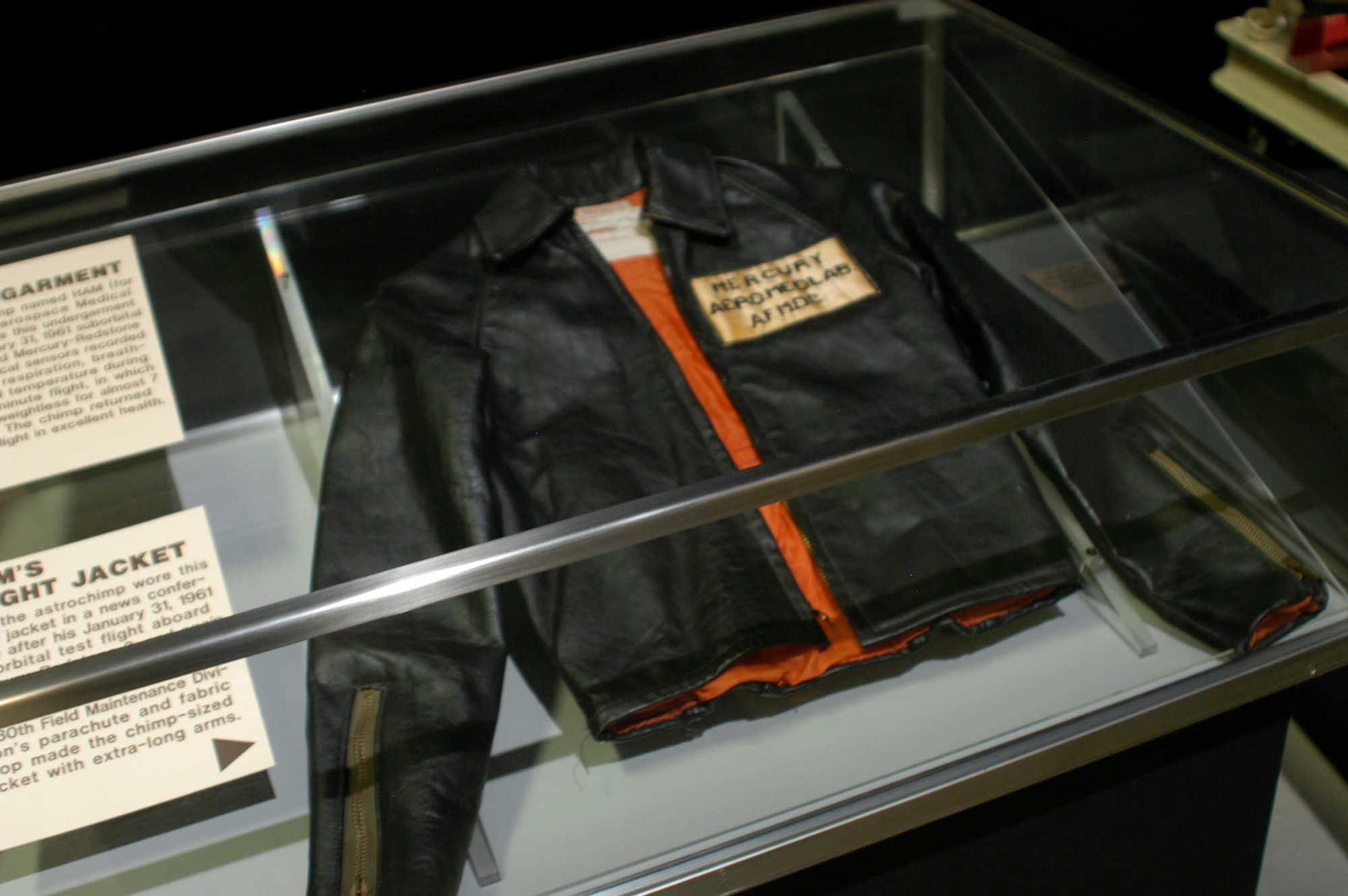 DAYTON, Ohio - HAM's flight jacket on display in the Missile & Space Gallery at the National Museum of the U.S. Air Force. (U.S. Air Force photo)