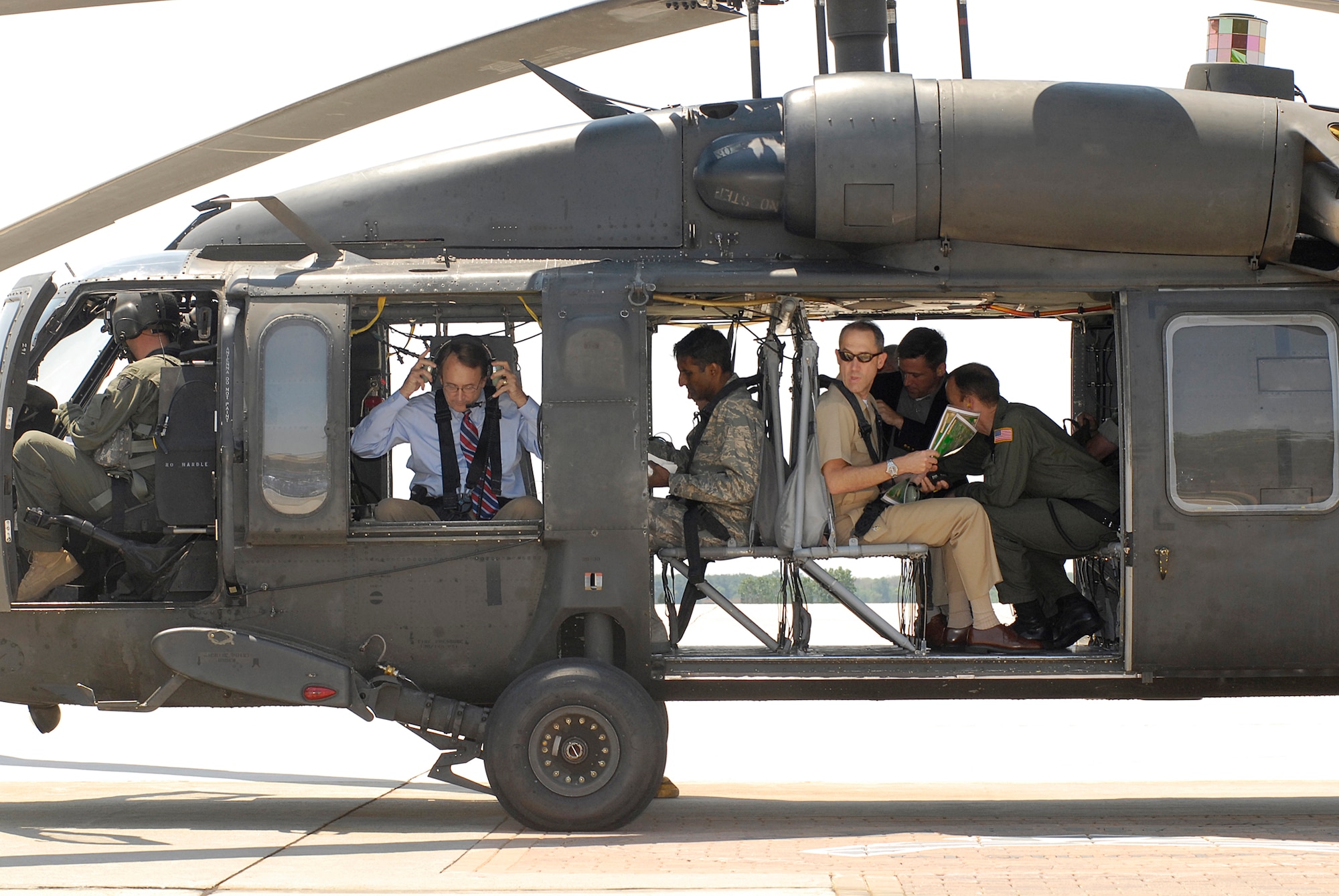 A UH-60 flown by the 1-150th Assault Helicopter Battalion, N.J. Air National Guard, prepares to takeoff from McGuire AFB with the Honorable Wayne Arny, Deputy Under Secretary of Defense-Installations and Environment, for an aerial tour of Joint Base McGuire-Dix-Lakehurst recently. Secretary Arny was accompanied by Col. Balan Ayyar, 305th Air Mobility Wing commander, Navy Capt. Phillip Beachy, Naval Air Engineering Station Lakehurst commanding officer, Col. Michael Polhemus, 305 AMW director of staff, and Mike Johnson, Congressman Jim Saxton’s military assistant. (U.S. Air Force courtesy photo)