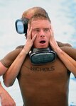 6/17/2008 - Students in the pararescue indoctrination course at the Lackland Training Annex recover after completing a 40-meter underwater swim June 17. The 10-week course trains future PJs through intense physical and mental training.  Only the best of the best will make it - the drop-out rate during the initial ten-week pararescue indoctrination course is typically sixty to seventy percent.
(USAF photo by Robbin Cresswell)