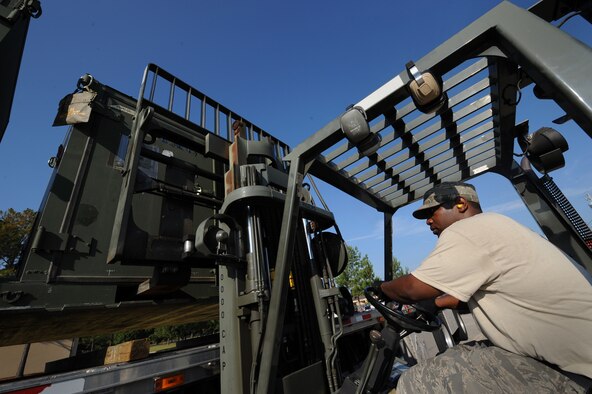 MOODY AIR FORCE BASE, Ga. -- Staff Sgt. Edwin Johnson, 23rd Logistics Readiness Squadron traffic management craftsman, puts an A-10C Thunderbolt II maintenance kit on a semi-truck here June 12. The kits were transported to MacDill Air Force Base, Fla., in support of the 23rd Aircraft Maintenance Squadron's participation in exercise Atlantic Strike. (U.S. Air Force photo by Senior Airman Gina Chiaverotti) 
